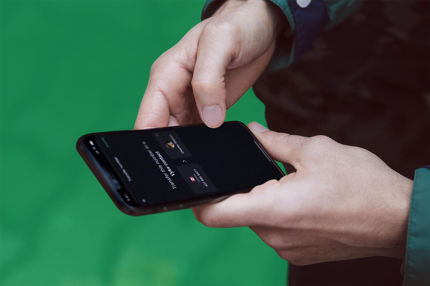 Close up of hands holding a phone with call.com app opened