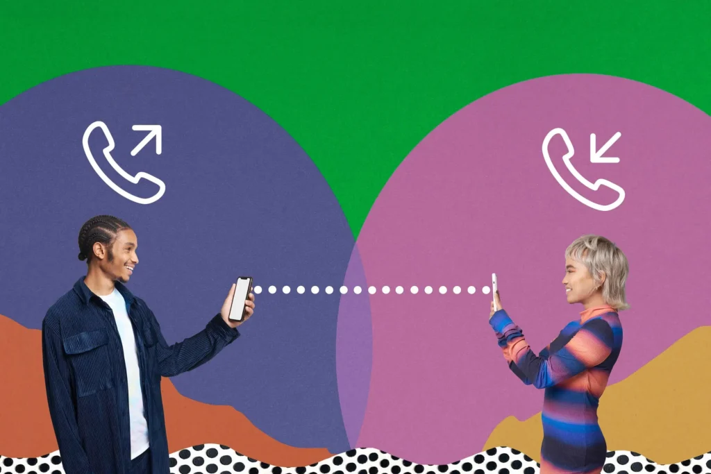 Two people smiling, connected by their mobile phone